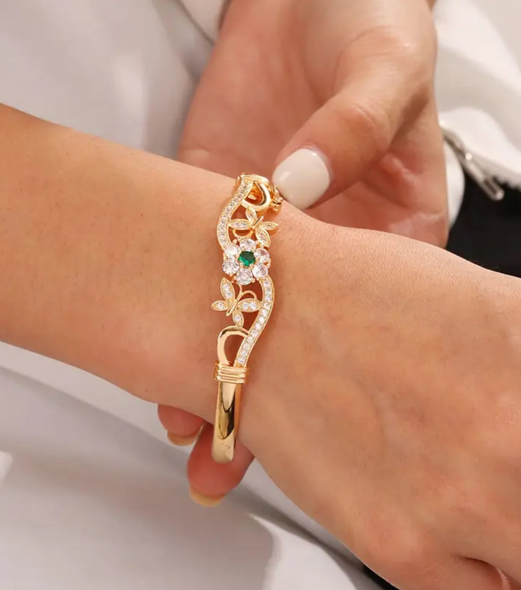 Elegant Rose Gold-Toned Bangle with Emerald Green and Clear Cubic Zirconia