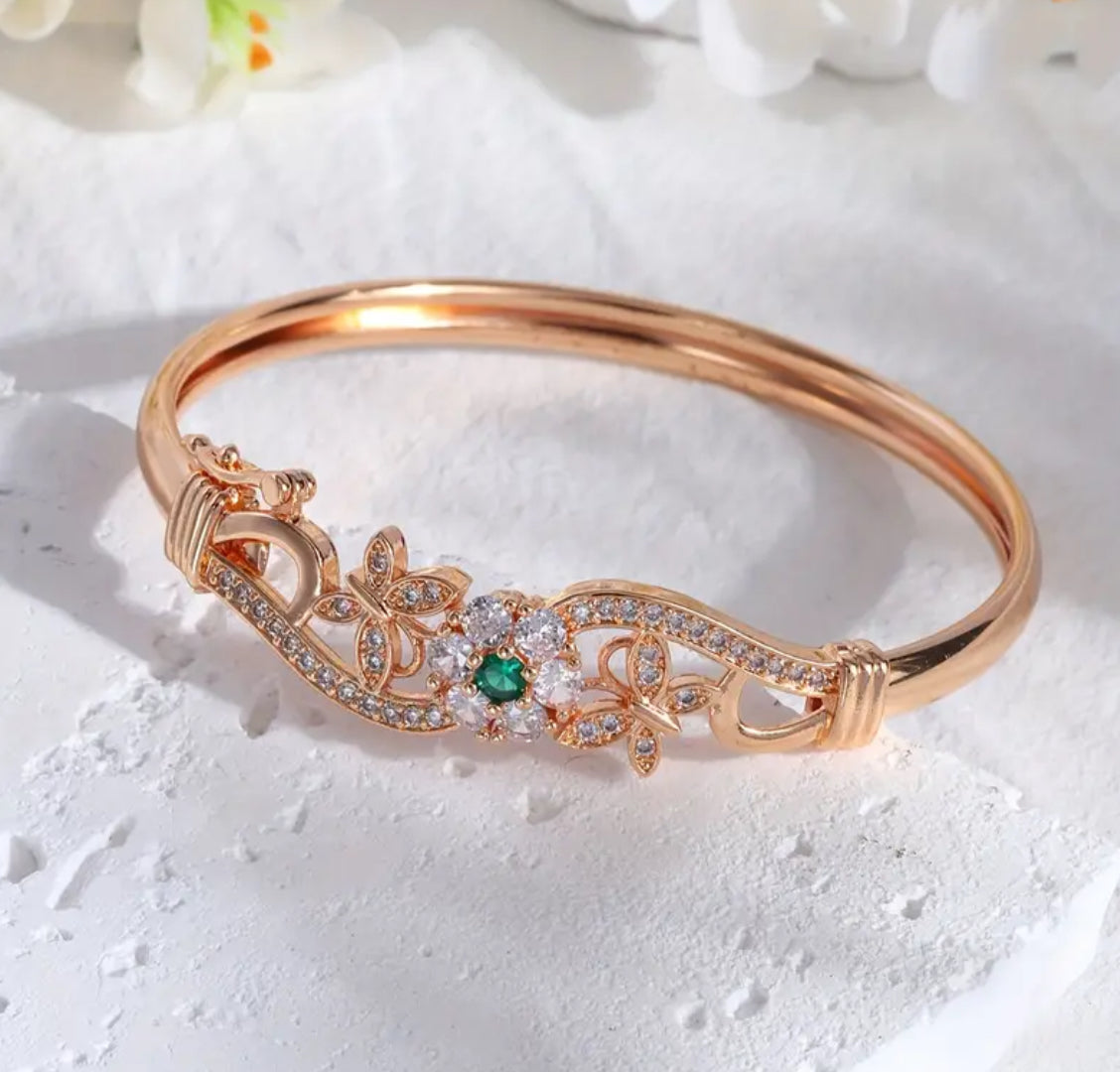 Elegant Rose Gold-Toned Bangle with Emerald Green and Clear Cubic Zirconia