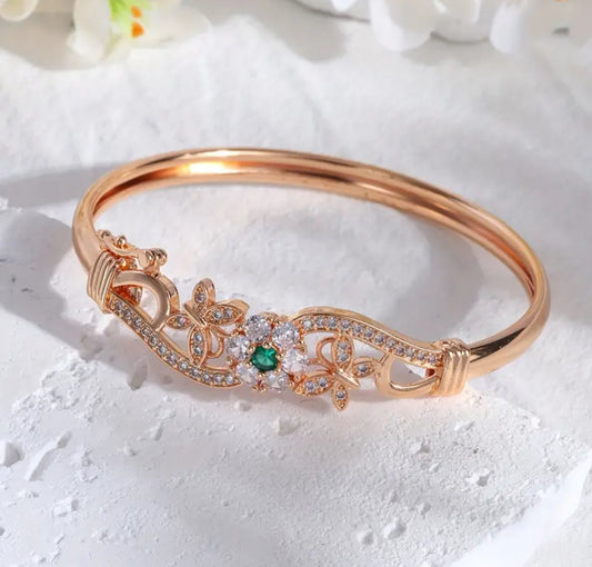 Elegant Rose Gold-Toned Bangle with Emerald Green and Clear Cubic Zirconia